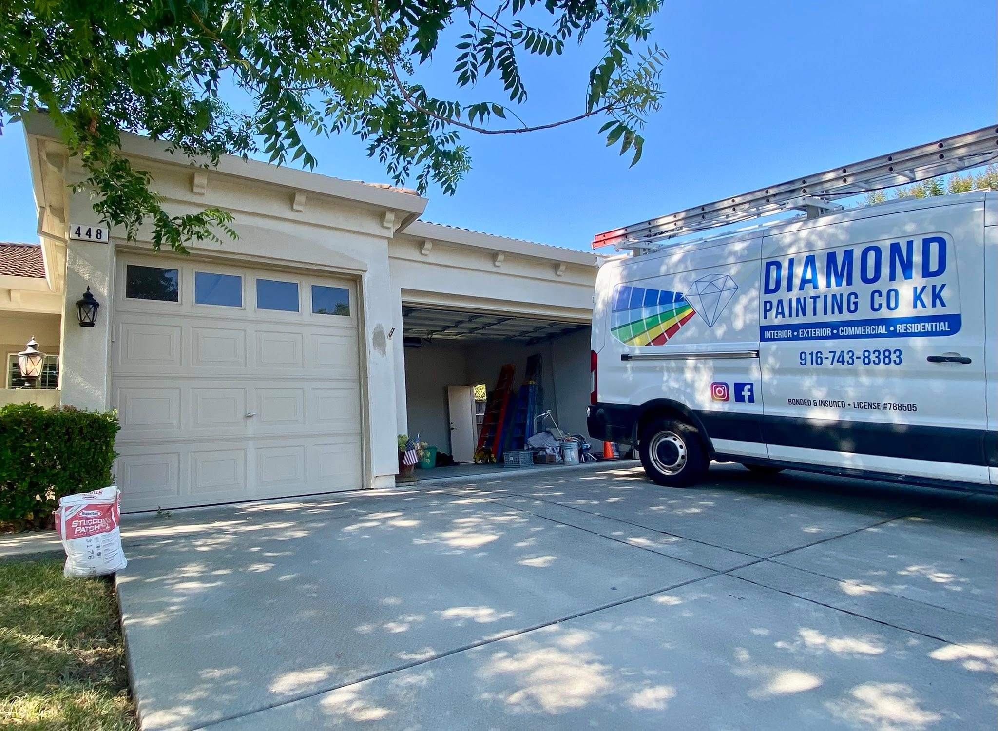 Diamond Painting Co. KK crew working together on a home
