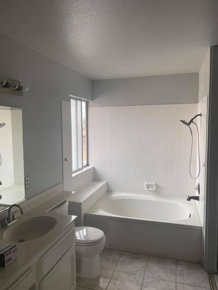 Bathroom interior repaint with soaking tub