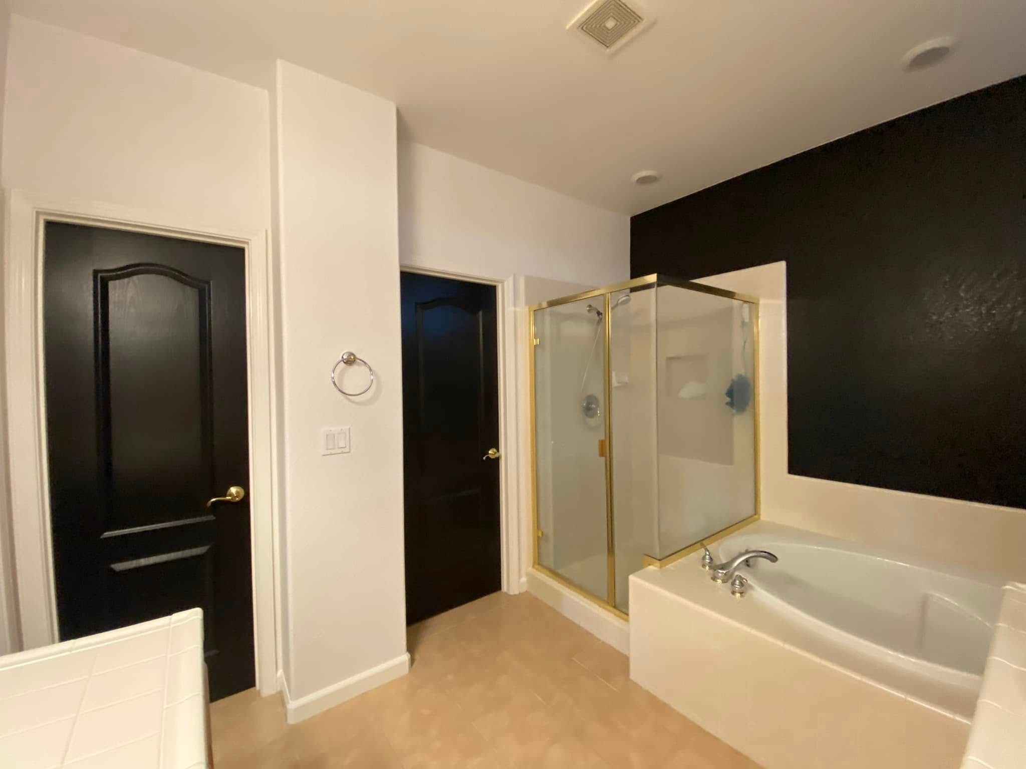 Master bathroom with soaking tub freshly painted